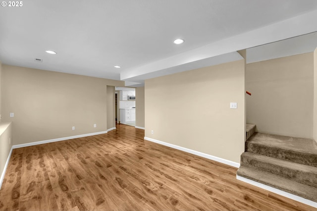 1320 NW Maple Ln, Camas, WA 98607 - basement with stairs, recessed lighting, wood finished floors, and baseboards