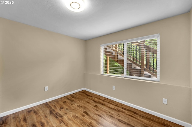 1320 NW Maple Ln, Camas, WA 98607 - empty room with baseboards and wood finished floors