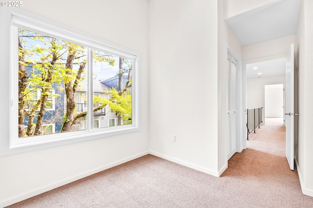 1442 SW 66th Ave, Portland, OR 97225 - spare room featuring carpet and baseboards