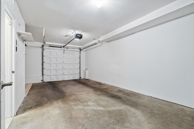 1442 SW 66th Ave, Portland, OR 97225 - garage featuring a garage door opener