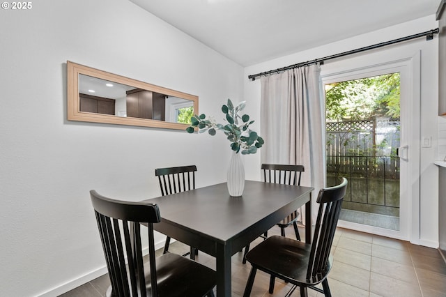 1442 SW 66th Ave, Portland, OR 97225 - dining space featuring tile patterned flooring and baseboards