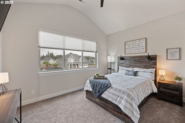 bedroom featuring baseboards, carpet, and lofted ceiling