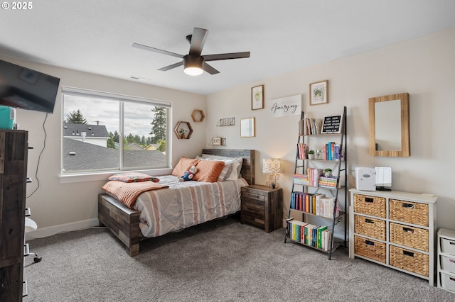 bedroom featuring baseboards, carpet, a ceiling fan, and visible vents