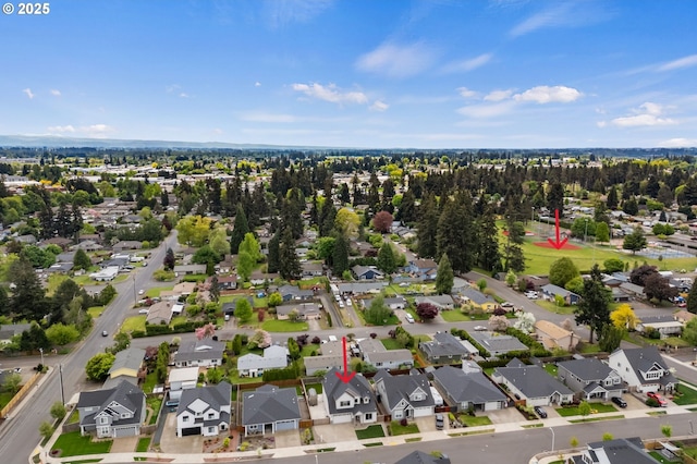 birds eye view of property with a residential view