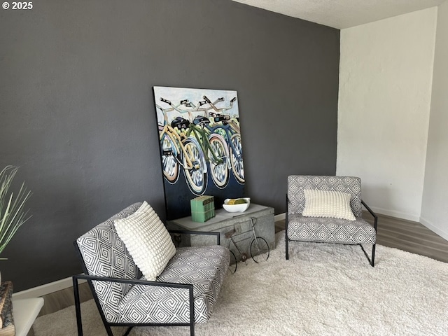 708 N Killingsworth St Unit 7, Portland, OR 97217 - living area featuring baseboards and wood finished floors