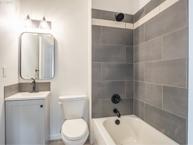 full bathroom featuring toilet, vanity, and shower / tub combination