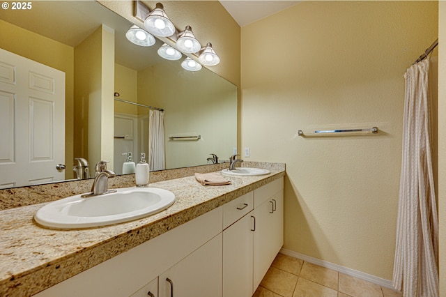 bathroom featuring tile patterned floors and vanity