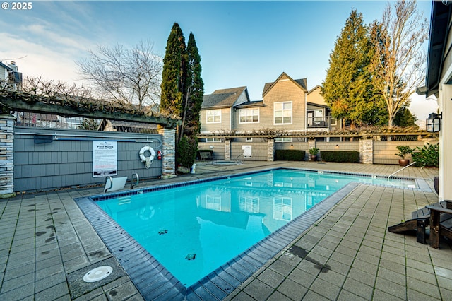 view of swimming pool featuring a patio