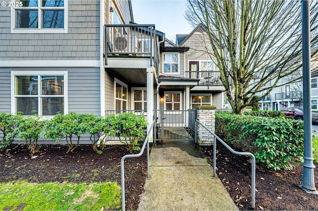 doorway to property featuring a balcony