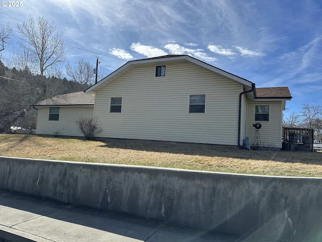 346 N Humbolt St, Canyon City, OR 97820 - view of home's exterior with roof with shingles and a yard
