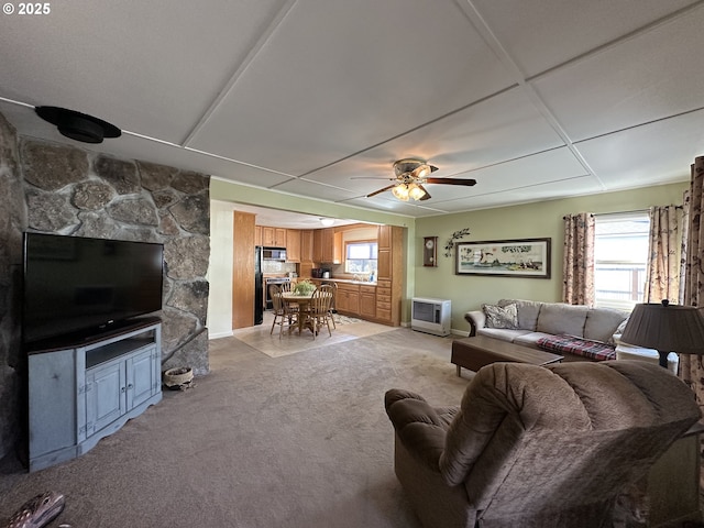 346 N Humbolt St, Canyon City, OR 97820 - living area featuring a ceiling fan, plenty of natural light, baseboards, and light colored carpet