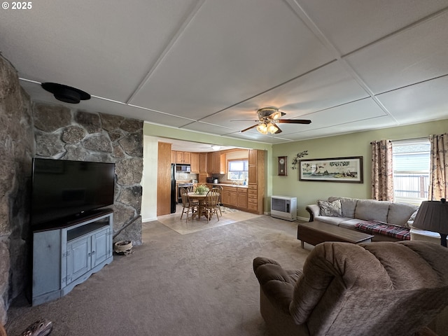 346 N Humbolt St, Canyon City, OR 97820 - living room featuring light colored carpet, baseboards, and a ceiling fan