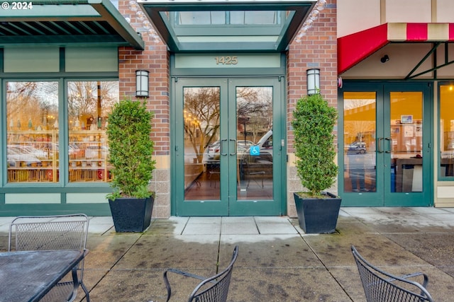 property entrance featuring french doors