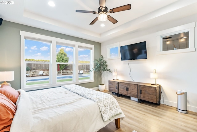 14015 NE 52nd Ave, Vancouver, WA 98686 - bedroom with a raised ceiling, light wood-type flooring, baseboards, recessed lighting, and a ceiling fan