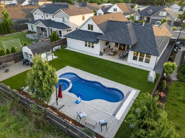 14015 NE 52nd Ave, Vancouver, WA 98686 - view of swimming pool with an outdoor living space, an outbuilding, a residential view, and a patio