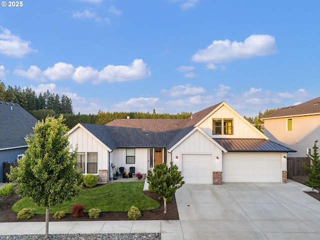 14015 NE 52nd Ave, Vancouver, WA 98686 - modern farmhouse with board and batten siding, concrete driveway, a shingled roof, and a standing seam roof