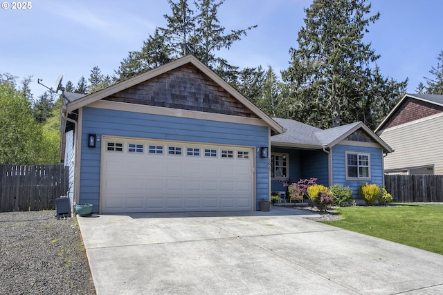 ranch-style home featuring concrete driveway, a garage, and a shingled roof