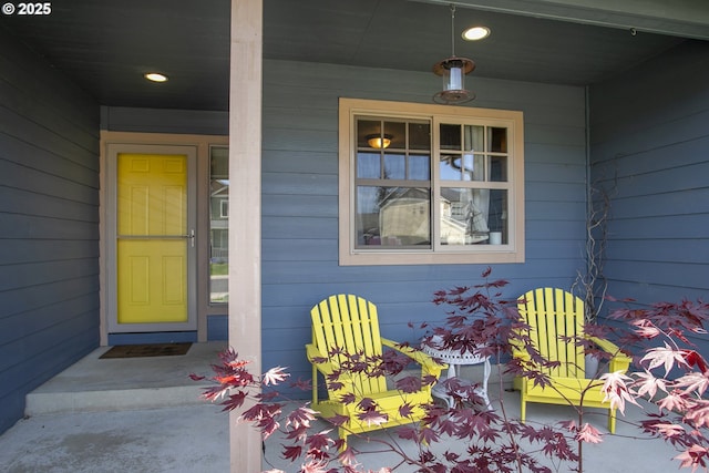 property entrance with covered porch