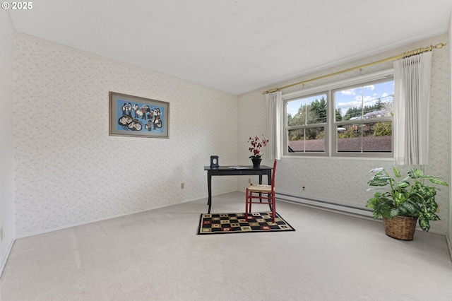 carpeted office featuring a baseboard heating unit