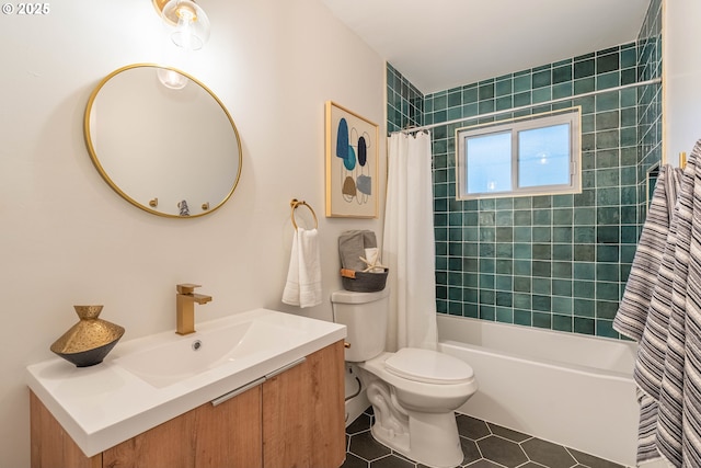 full bathroom featuring vanity, toilet, tile patterned flooring, and shower / bath combo