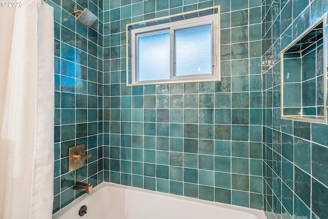 bathroom featuring shower / bathtub combination with curtain