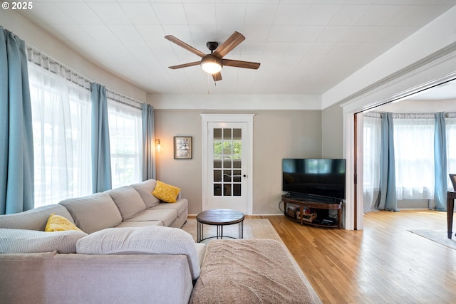233 SE 28th Ave, Portland, OR 97214 - living room featuring ceiling fan and light wood-style flooring