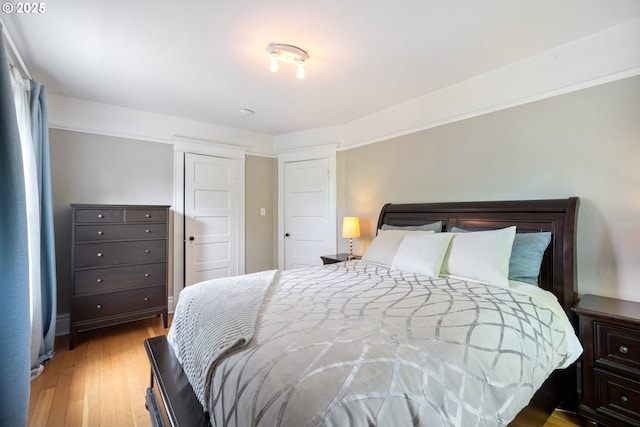 233 SE 28th Ave, Portland, OR 97214 - bedroom with light wood-style floors