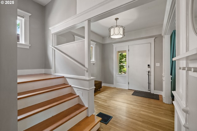 233 SE 28th Ave, Portland, OR 97214 - entrance foyer with stairway, baseboards, and light wood-style floors