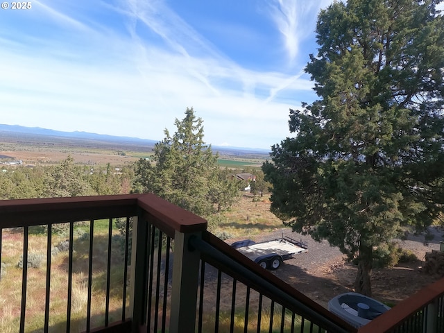 balcony featuring a mountain view