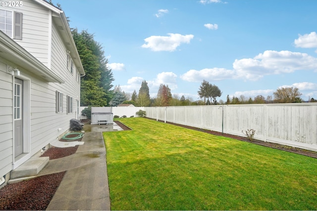 view of yard featuring a fenced backyard and a patio