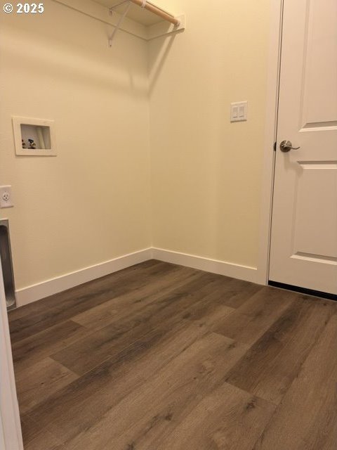 laundry room with hookup for a washing machine and dark wood-type flooring