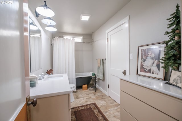 full bathroom featuring vanity, toilet, and shower / bath combo with shower curtain