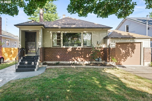 1422 NE 57th Ave, Portland, OR 97213 - view of front of property featuring brick siding, a chimney, a front lawn, and a garage