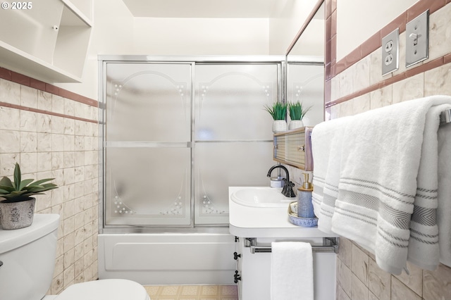1422 NE 57th Ave, Portland, OR 97213 - full bathroom with tile walls, enclosed tub / shower combo, and vanity