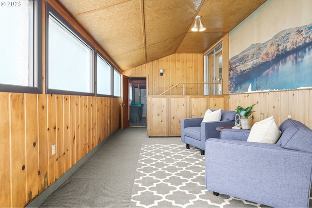 1422 NE 57th Ave, Portland, OR 97213 - sitting room featuring wood walls, vaulted ceiling, and carpet floors