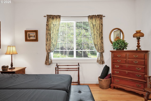 83485 Clear Lake Rd, Florence, OR 97439 - bedroom featuring wood finished floors and baseboards