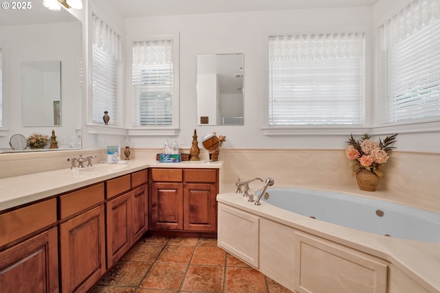 83485 Clear Lake Rd, Florence, OR 97439 - bathroom featuring healthy amount of natural light, a whirlpool tub, and vanity