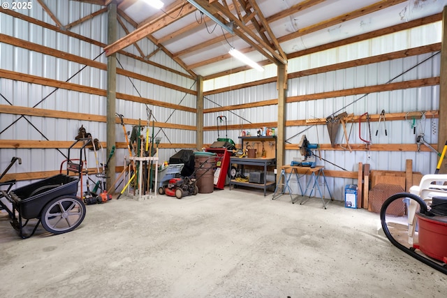 83485 Clear Lake Rd, Florence, OR 97439 - garage with metal wall and a workshop area