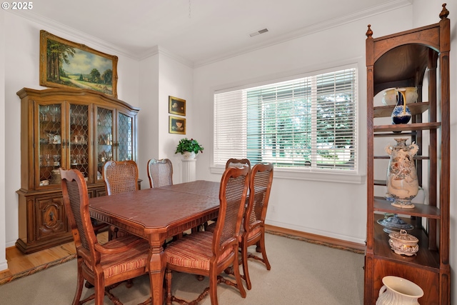83485 Clear Lake Rd, Florence, OR 97439 - dining area featuring ornamental molding and baseboards