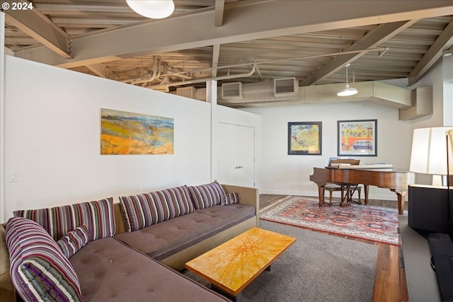 living room with beamed ceiling