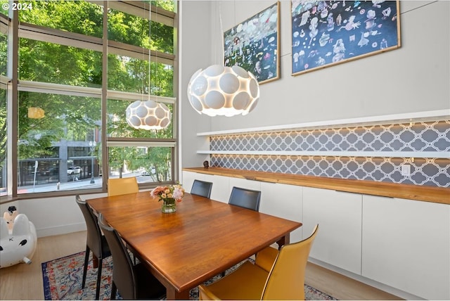 dining space featuring light hardwood / wood-style floors