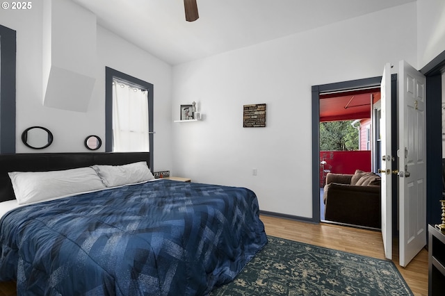 bedroom featuring hardwood / wood-style flooring and ceiling fan