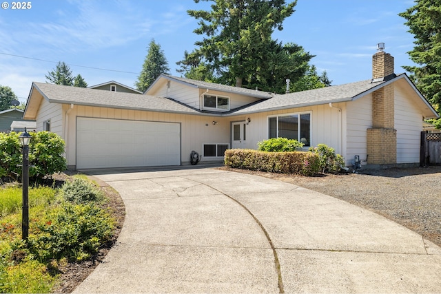 851 SE 137th Ave, Portland, OR 97233 - view of front of home with an attached garage, a chimney, driveway, roof with shingles, and board and batten siding