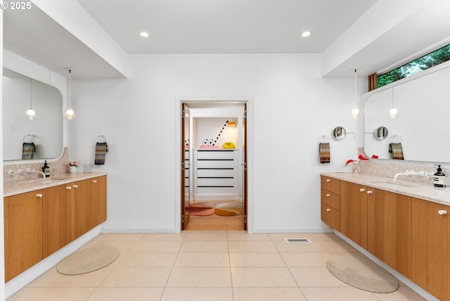 bathroom featuring vanity and tile patterned flooring