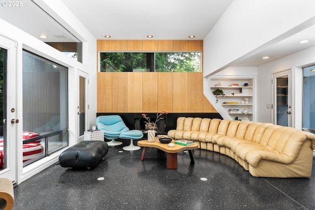 living room featuring a fireplace