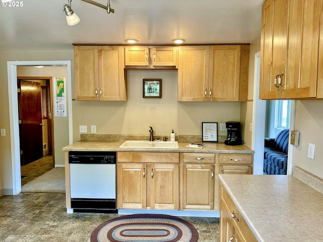 26230 Sandlake Rd, Cloverdale, OR 97112 - kitchen featuring dishwasher, a sink, light countertops, and light brown cabinetry