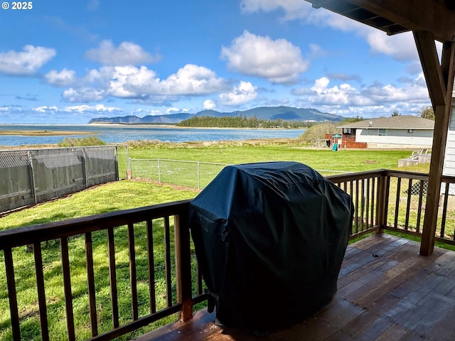 26230 Sandlake Rd, Cloverdale, OR 97112 - deck featuring grilling area, a water and mountain view, and a playground