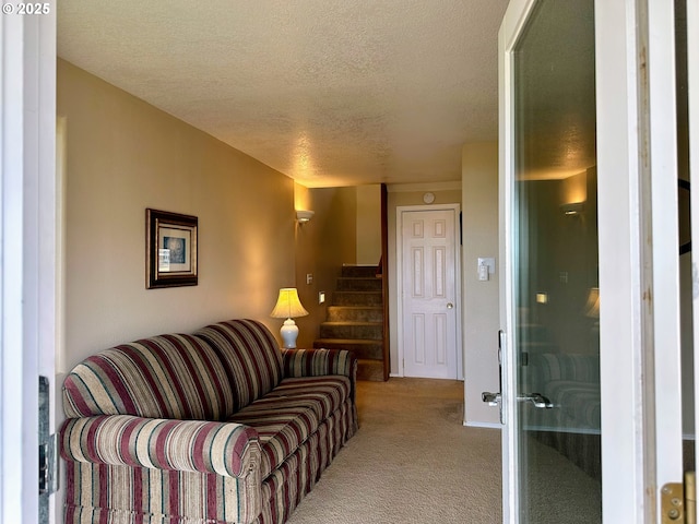 26230 Sandlake Rd, Cloverdale, OR 97112 - living area featuring carpet, a textured ceiling, and stairway