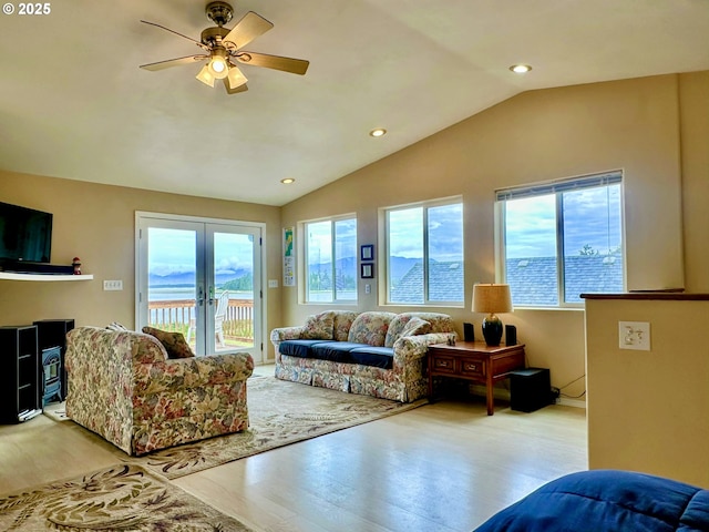 26230 Sandlake Rd, Cloverdale, OR 97112 - living area featuring healthy amount of natural light, vaulted ceiling, wood finished floors, recessed lighting, and a ceiling fan