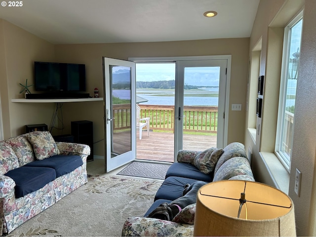 26230 Sandlake Rd, Cloverdale, OR 97112 - carpeted living room featuring healthy amount of natural light and recessed lighting